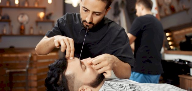 أضرار إزالة الشعر بالخيط